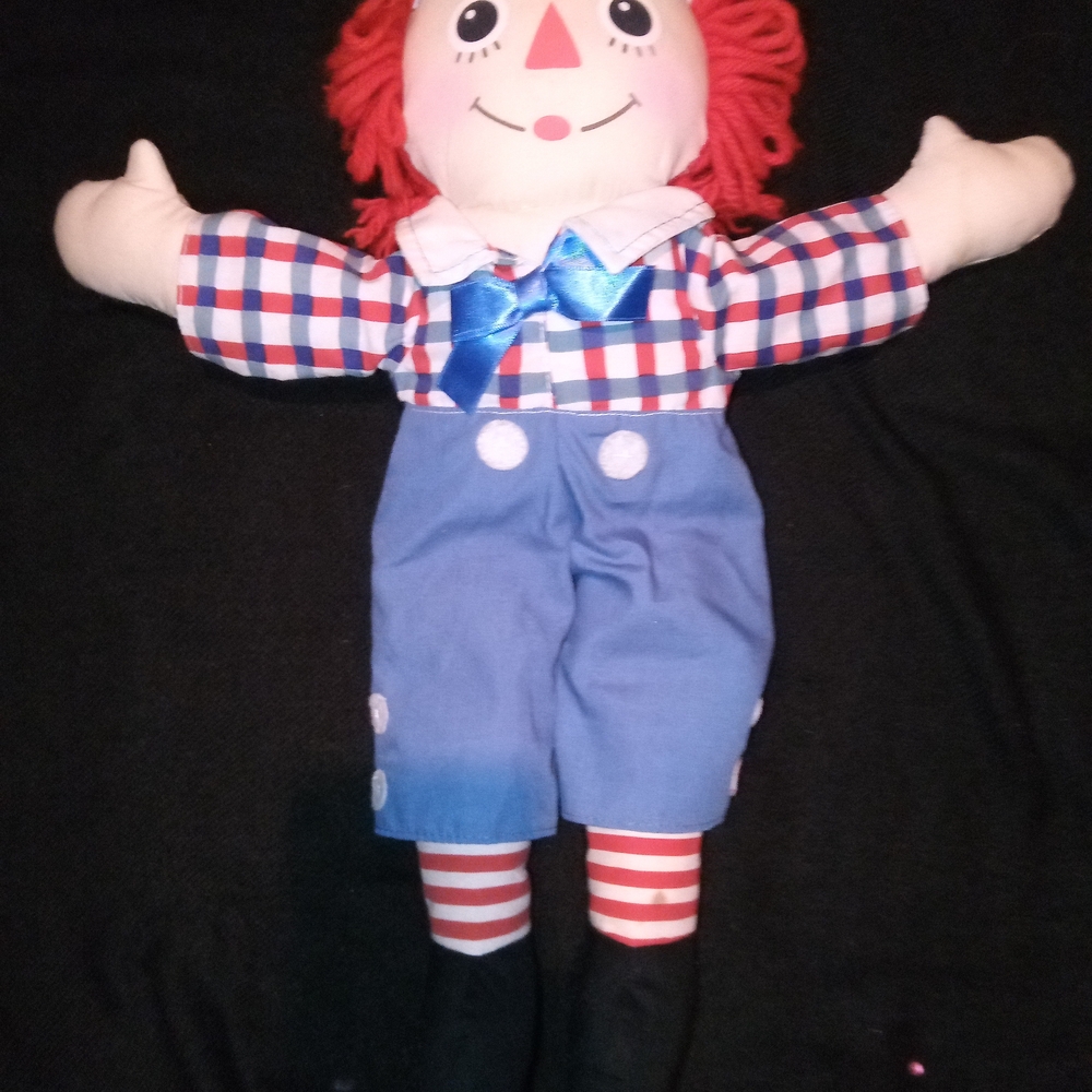 Red and Blue Stuffed Animal with Fluffy Hair